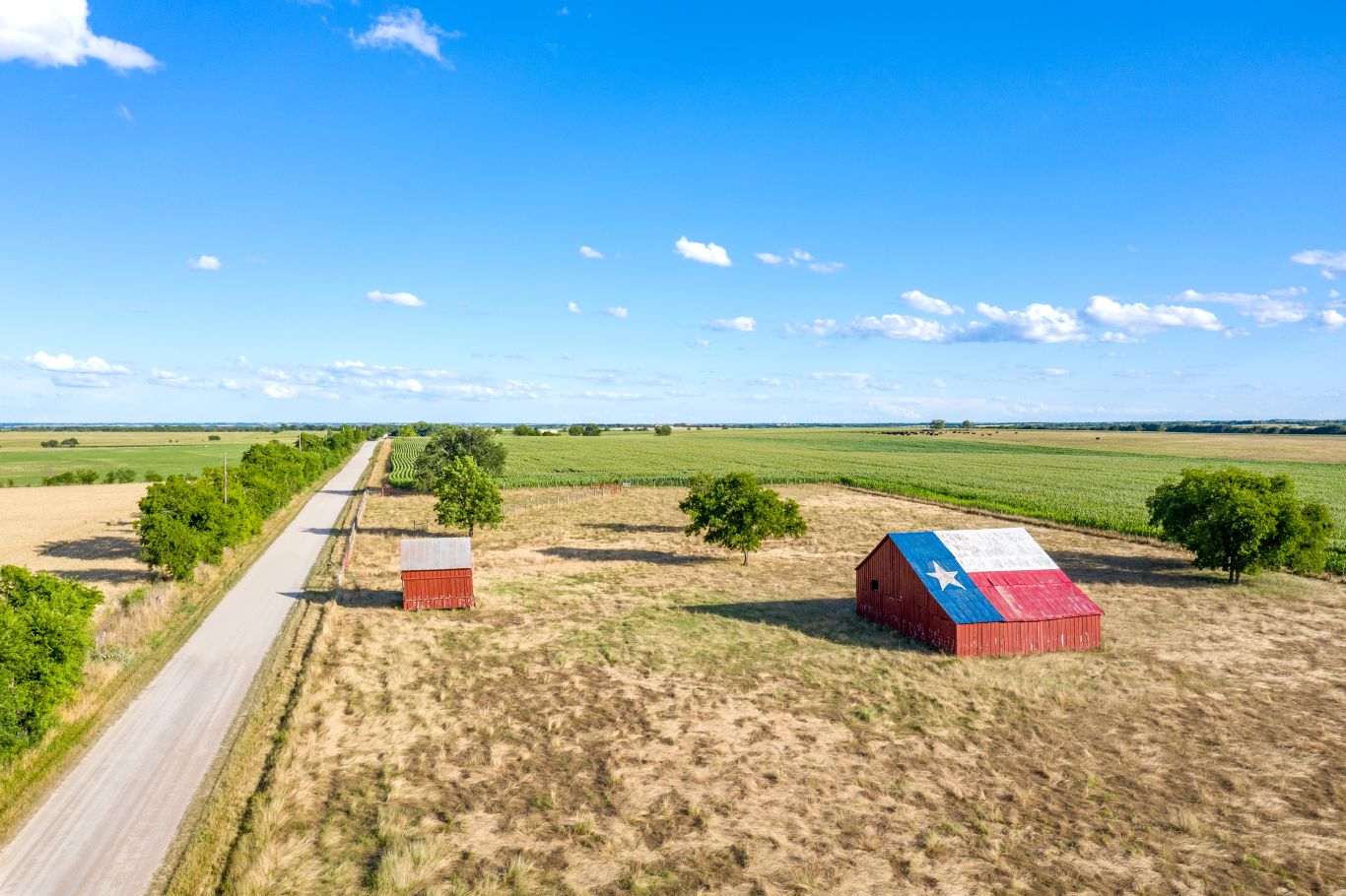 Semi-truck driving through rural Arkansas roads, symbolizing regional trucking insurance needs
