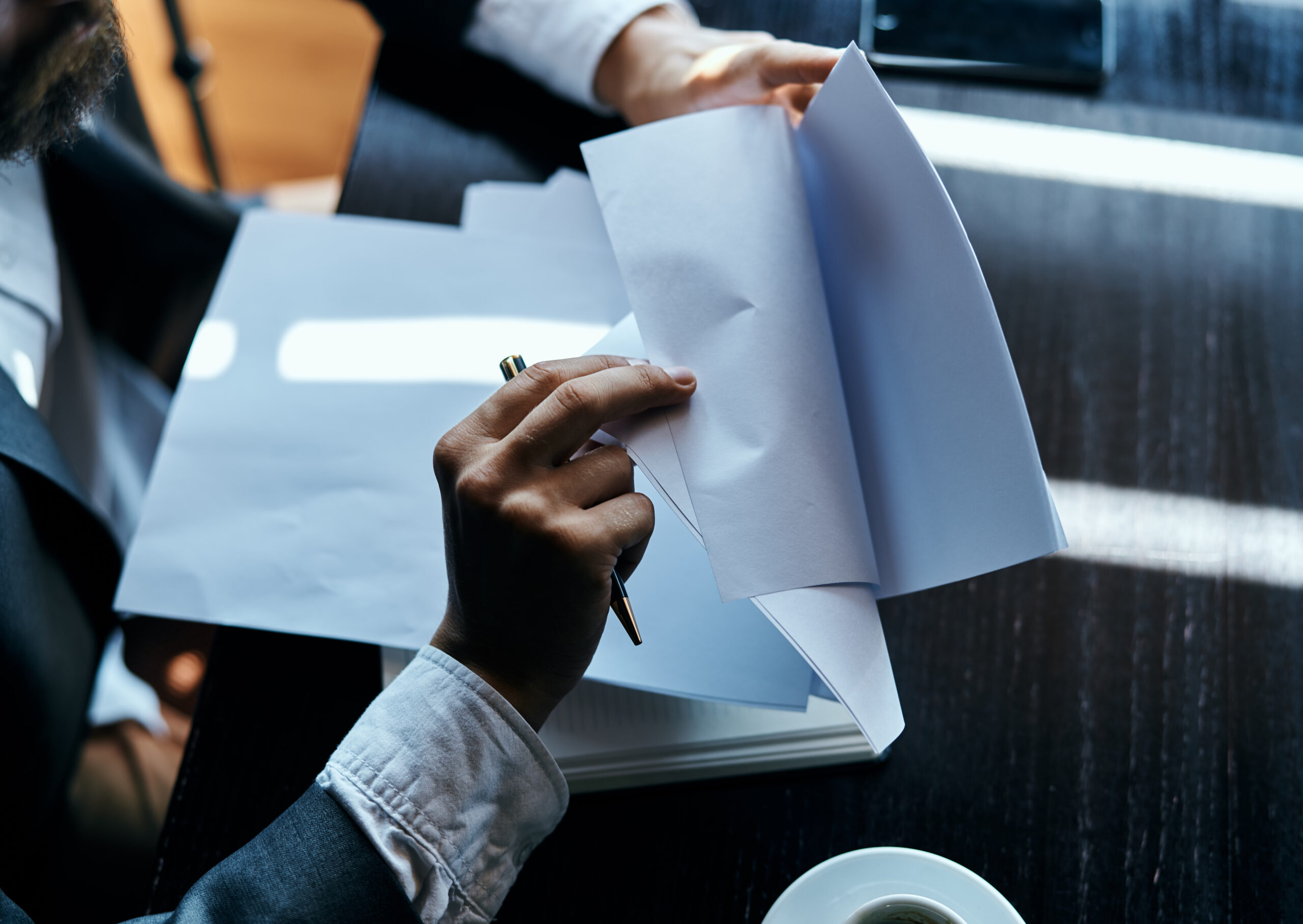 Multiple semi trucks lined up at a distribution center representing trucking fleet growth and commercial truck insurance strategy